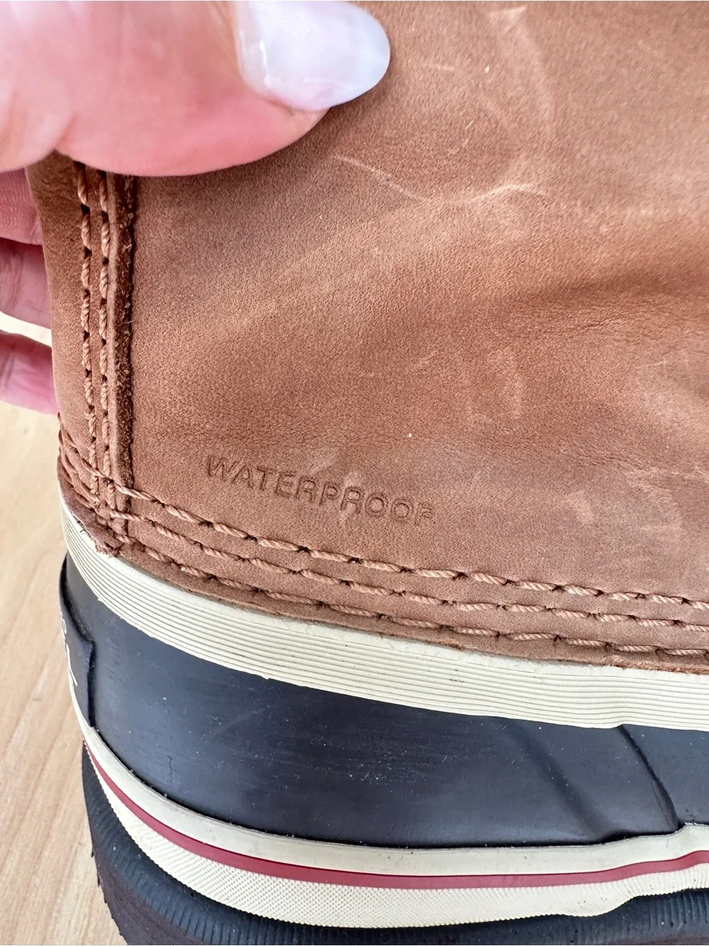 Sorel Tan and Black Waterproof Winter Boot with Red-Accent Laces